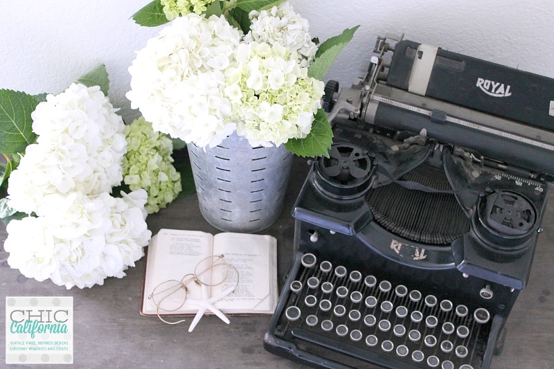 vintage olive bucket and typewriter